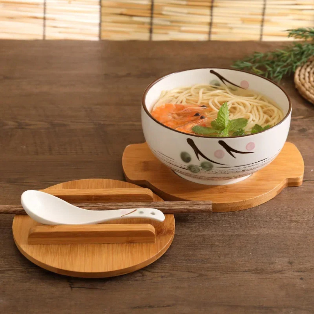 white ramen bowl set on table